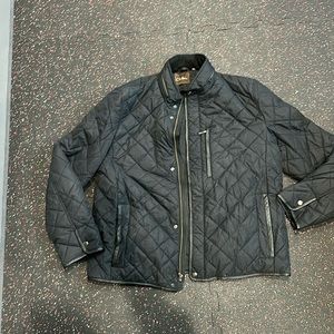 Cole Haan Diamond quilted thermore jacket with leather detailing.